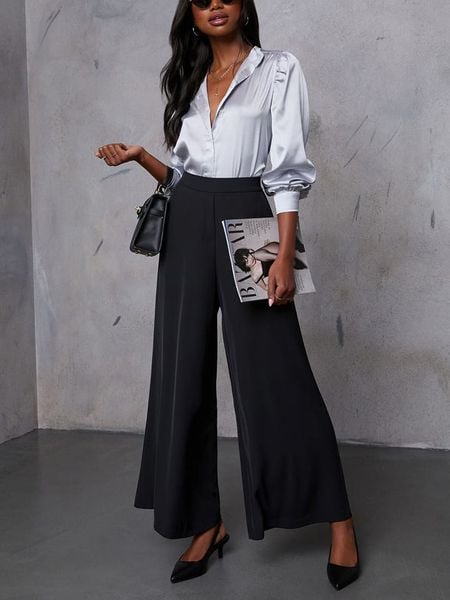 LA Angels Spodnie w kolorze czarnym rozmiar: S. Czarne spodnie materiałowe LA Angels, bez wzorów, z materiału, z podwyższonym stanem. Za 187.52 zł.