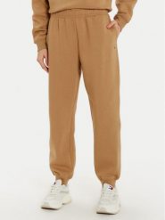 Tommy Hilfiger Spodnie dresowe Essential WW0WW45966 Beżowy Regular Fit. Brązowe spodnie dresowe Tommy Hilfiger, bez wzorów, z bawełny. Za 299.99 zł.