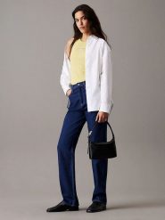 Calvin Klein Dżinsy - Regular fit - w kolorze granatowym rozmiar: W26/L34. Niebieskie jeansy Calvin Klein, l, z aplikacjami, klasyczne, z podwyższonym stanem. Za 295.99 zł.