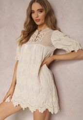 Jasnobeżowa Tunika z Bawełny Thaelelle. Brązowe sukienki Renee, s, z aplikacjami, z bawełny, boho, bez kołnierzyka, bez ramiączek, mini. W wyprzedaży za 99.99 zł.