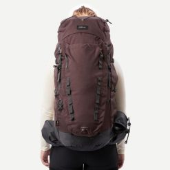 Plecak trekkingowy damski Forclaz MT900 Symbium 60+10 l. Brązowe plecaki FORCLAZ, bez wzorów, z poliamidu, bez dodatków. Za 699.99 zł.