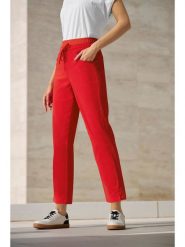 Heine Spodnie dresowe w kolorze czerwonym rozmiar: 40. Czerwone spodnie sportowe Heine, bez wzorów, z dresówki. Za 63.45 zł.