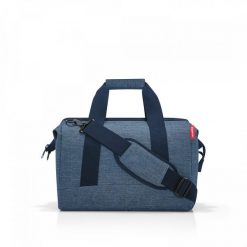 Torba allrounder M twist blue. Niebieskie torby podróżne Reisenthel, bez wzorów, z tkaniny, na ramię, duże. W wyprzedaży za 139.90 zł.