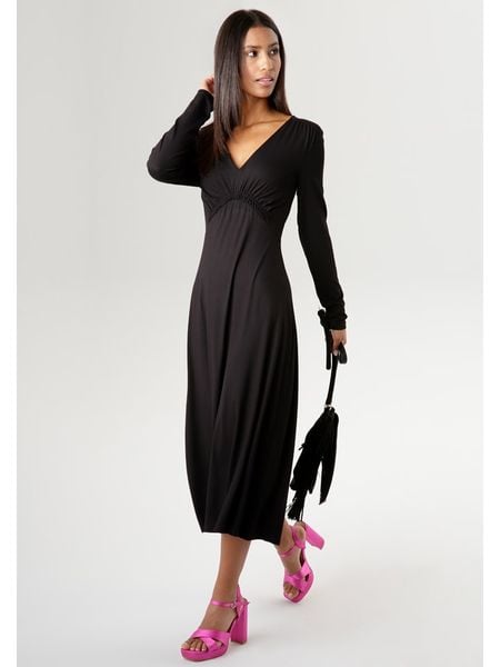 Aniston Sukienka w kolorze czarnym rozmiar: 44. Czarne sukienki Aniston, bez wzorów, bez kołnierzyka, bez ramiączek, maxi. Za 65.38 zł.