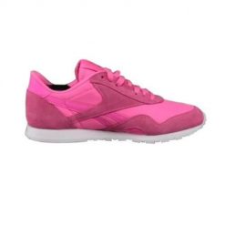 Buty do chodzenia damskie Reebok CL Nylon Slim Metal. Białe buty treningowe Reebok, bez wzorów, z materiału, bez zapięcia, trekkingowe. Za 236.00 zł.