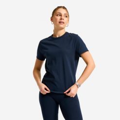 Koszulka fitness damska Domyos. Niebieskie t-shirty sportowe DOMYOS, xl, bez wzorów, z bawełny, bez ramiączek, na fitness i siłownię. Za 12.49 zł.