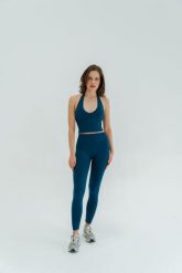 Legginsy modelujące do jogi Moonholi Malibu Evenings z wysokim stanem. Niebieskie legginsy sportowe MOONHOLI, m, bez wzorów, z materiału, z podwyższonym stanem, na fitness i siłownię. Za 359.00 zł.