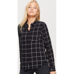 Klasyczna koszula z nadrukiem - Czarny. Koszule marki QUECHUA. W wyprzedaży za 39.99 zł.