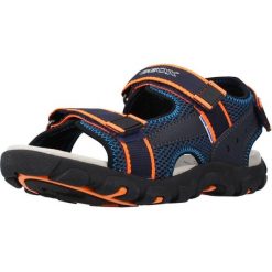 Sandały GEOX JR SANDAL STRADA A Niebieski. Niebieskie sandały Geox, bez wzorów, ze skóry, bez obcasa, bez zapięcia. Za 139.99 zł.