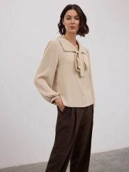 BGN Bluzka w kolorze beżowym rozmiar: 38. Brązowe bluzki BGN, bez wzorów, bez kołnierzyka, bez ramiączek. Za 127.05 zł.