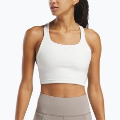 Koszulka Reebok Lux Tank. Białe topy sportowe REEBOK FITNESS, bez wzorów, na fitness i siłownię. Za 209.99 zł.
