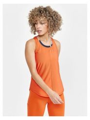 Craft Top sportowy "Core Charge" w kolorze pomarańczowym rozmiar: XS. Pomarańczowe topy sportowe Craft, xs, bez wzorów, z materiału, outdoorowe. Za 43.99 zł.