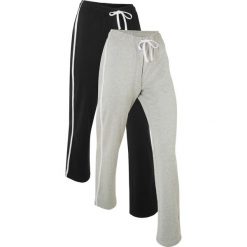 Spodnie dresowe z grubej bawełny (2 pary). Czarne spodnie dresowe bonprix, bez wzorów, z bawełny. Za 147.99 zł.