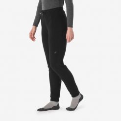 Legginsy turystyczne damskie MH100. Czarne legginsy QUECHUA, bez wzorów, z dzianiny, wakacyjne. Za 59.99 zł.