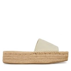 Klapki Calvin Klein. Niebieskie klapki Calvin Klein, bez wzorów, bez obcasa, bez zapięcia. Za 409.99 zł.