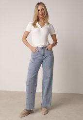 Niebieskie Jeansy z Bawełną o Szerokim Kroju z Wysokim Stanem Ozdobione Haftem Oslian. Niebieskie jeansy Born2be, bez wzorów, z bawełny, eleganckie, z podwyższonym stanem, długie. Za 129.99 zł.