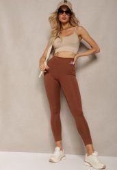 Brązowe Legginsy High Waist z Gumką w Pasie Cloen. Brązowe legginsy Renee, bez wzorów, z jeansu, klasyczne. W wyprzedaży za 23.99 zł.
