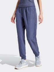 Adidas Spodnie dresowe w kolorze niebieskim rozmiar: M. Niebieskie spodnie dresowe adidas, bez wzorów, z dresówki. Za 200.95 zł.