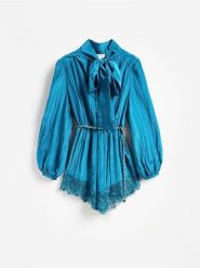 Kombinezon z wiskozą - turkusowy. Niebieskie kombinezony Reserved, l, bez wzorów, z tkaniny, bez kołnierzyka, bez ramiączek. Za 259.99 zł.