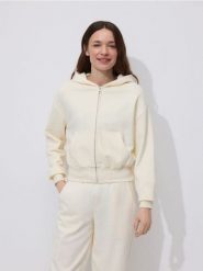 Rozpinana bluza - kremowy. Białe bluzy Reserved, l, bez wzorów, z bawełny, bez ramiączek, bez kaptura. Za 109.99 zł.