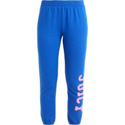 Juicy Couture TERRY LOGO VARSITY PANT Spodnie treningowe sea breeze. Niebieskie spodnie dresowe marki comma casual identity, z materiału, casualowe. Za 189.00 zł.