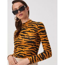 Bluzka ze zwierzęcym wzorem - Żółty. Żółte bluzki Sinsay, l, bez wzorów, bez kołnierzyka, bez ramiączek. Za 24.99 zł.