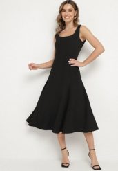 Czarna Klasyczna Sukienka o Rozkloszowanym Kroju Delure. Czarne sukienki Born2be, l, z aplikacjami, eleganckie, bez kołnierzyka, bez ramiączek, midi, rozkloszowane. W wyprzedaży za 84.99 zł.