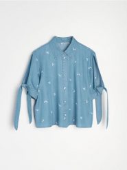 Lyocellowa koszula light denim z wiązanymi rękawami - niebieski. Niebieskie koszule Sinsay, l, bez wzorów, z denimu, bez kołnierzyka, bez ramiączek. Za 59.99 zł.