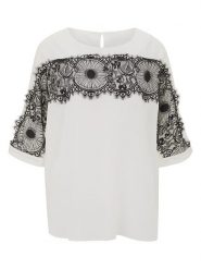 Heine Jedwabna bluzka w kolorze kremowym rozmiar: 48/50. Brązowe bluzki Heine, bez wzorów, z jedwabiu, bez kołnierzyka, bez ramiączek. Za 48.05 zł.