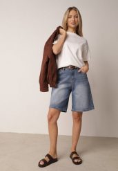 Niebieskie Bawełniane Szorty Jeansowe Bermudy z Wysokim Stanem Avariel. Niebieskie szorty Born2be, bez wzorów, z bawełny, eleganckie. Za 89.99 zł.