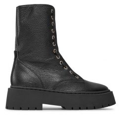 Trapery Steve Madden. Czarne traperki Steve Madden, bez wzorów, bez obcasa, bez zapięcia. Za 799.99 zł.