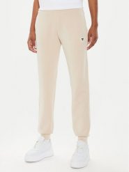 Guess Spodnie dresowe V4YB08 KCAY2 Beżowy Regular Fit. Brązowe spodnie dresowe Guess, z aplikacjami, z dresówki. Za 345.00 zł.