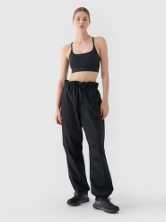 4F Spodnie casual parachute oversize damskie - czarne XL. Czarne spodnie materiałowe 4f, bez wzorów, z bawełny, casualowe. W wyprzedaży za 59.99 zł.