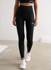 Damskie legginsy z wysokim stanem, squat proof, z tylną kieszenią Core czarne. Czarne legginsy AIM'N, bez wzorów, z elastanu, sportowe. Za 296.00 zł.