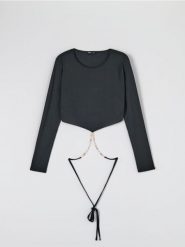 Bluzka z wiązaniem - czarny. Czarne bluzki Sinsay, l, bez wzorów, bez kołnierzyka, bez ramiączek. W wyprzedaży za 29.99 zł.