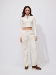 Bluza z wysoką stójką - jasnożółty. Żółte bluzy Reserved, l, bez wzorów, z bawełny, bez ramiączek, bez kaptura. Za 89.99 zł.