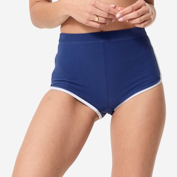 Dół kostiumu kąpielowego surfingowego damski Olaian Caro. Niebieskie bikini OLAIAN, bez wzorów, z elastanu, retro. W wyprzedaży za 49.99 zł.