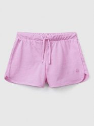 Benetton Szorty w kolorze fioletowym rozmiar: 140. Różowe szorty Benetton, bez wzorów, z bawełny. Za 35.26 zł.