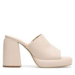 Klapki JENNY. Brązowe klapki Jenny, bez wzorów, bez obcasa, bez zapięcia. Za 139.99 zł.