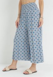 Jasnoniebieskie Wiskozowe Spodnie z Cienkimi Gumkami w Pasie i Wysokim Stanem Isalena. Niebieskie jeansy Born2be, na lato, l, bez wzorów, z jeansu, z podwyższonym stanem. Za 69.99 zł.