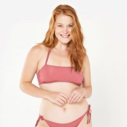 Góra kostiumu kąpielowego surfingowego damska Olaian Laura Folk. Czerwone bikini OLAIAN, bez wzorów, z elastanu, sportowe. W wyprzedaży za 39.99 zł.