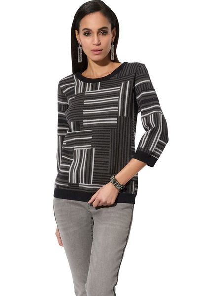 Creation L Sweter w kolorze czarno-białym rozmiar: 42. Czarne swetry creation L, l, bez wzorów, bez ramiączek. Za 56.79 zł.