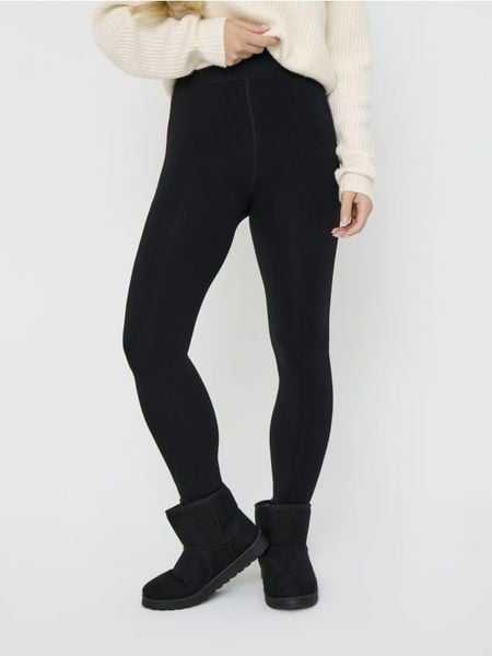 Legginsy - czarny. Czarne legginsy Sinsay, bez wzorów, długie. Za 29.99 zł.