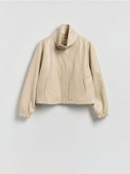 Kurtka z wysoką stójką - beżowy. Brązowe kurtki Reserved, l, bez wzorów, ze skóry, bez kaptura. Za 199.99 zł.