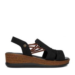 Sandały Go Soft. Czarne sandały GO SOFT, bez wzorów, bez obcasa, na koturnie, bez zapięcia. Za 179.99 zł.