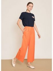 BGN Spodnie w kolorze pomarańczowym rozmiar: 38. Pomarańczowe spodnie materiałowe BGN, bez wzorów, z materiału. Za 121.99 zł.