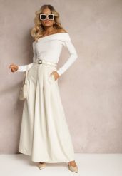 Jasnobeżowe Spodnie Typu Kuloty z Paskiem z Imitacji Skóry z Klamrą i Ozdobnymi Zakładkami Drisanda. Brązowe jeansy Renee, s, bez wzorów, z jeansu, eleganckie. W wyprzedaży za 99.99 zł.