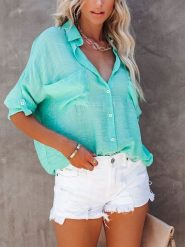 Milan Kiss Bluzka w kolorze turkusowym rozmiar: XL. Niebieskie bluzki Milan Kiss, xl, bez wzorów, z bawełny, bez kołnierzyka, bez ramiączek. Za 131.74 zł.