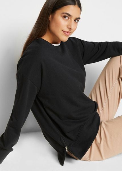 Bluza z mieszanki bawełny. Czarne bluzy bonprix, bez wzorów, z bawełny, bez ramiączek, bez kaptura. Za 79.99 zł.