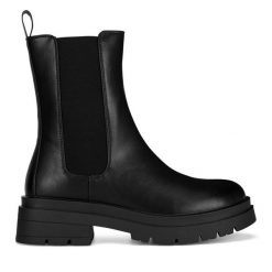 Sztyblety JENNY. Czarne botki Jenny, bez wzorów, bez obcasa, na płaskiej podeszwie, bez zapięcia. Za 169.99 zł.